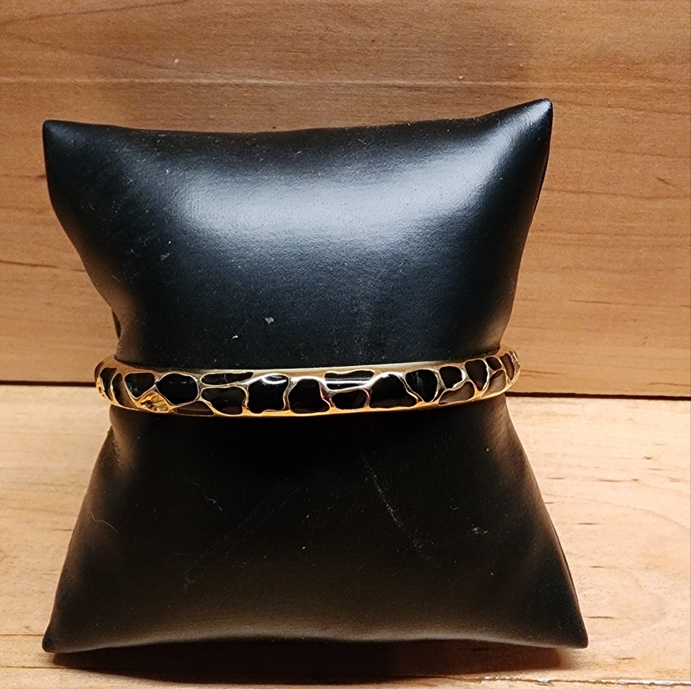 SIgned KJL bangle bracelet black enamel animal print design over gold tone